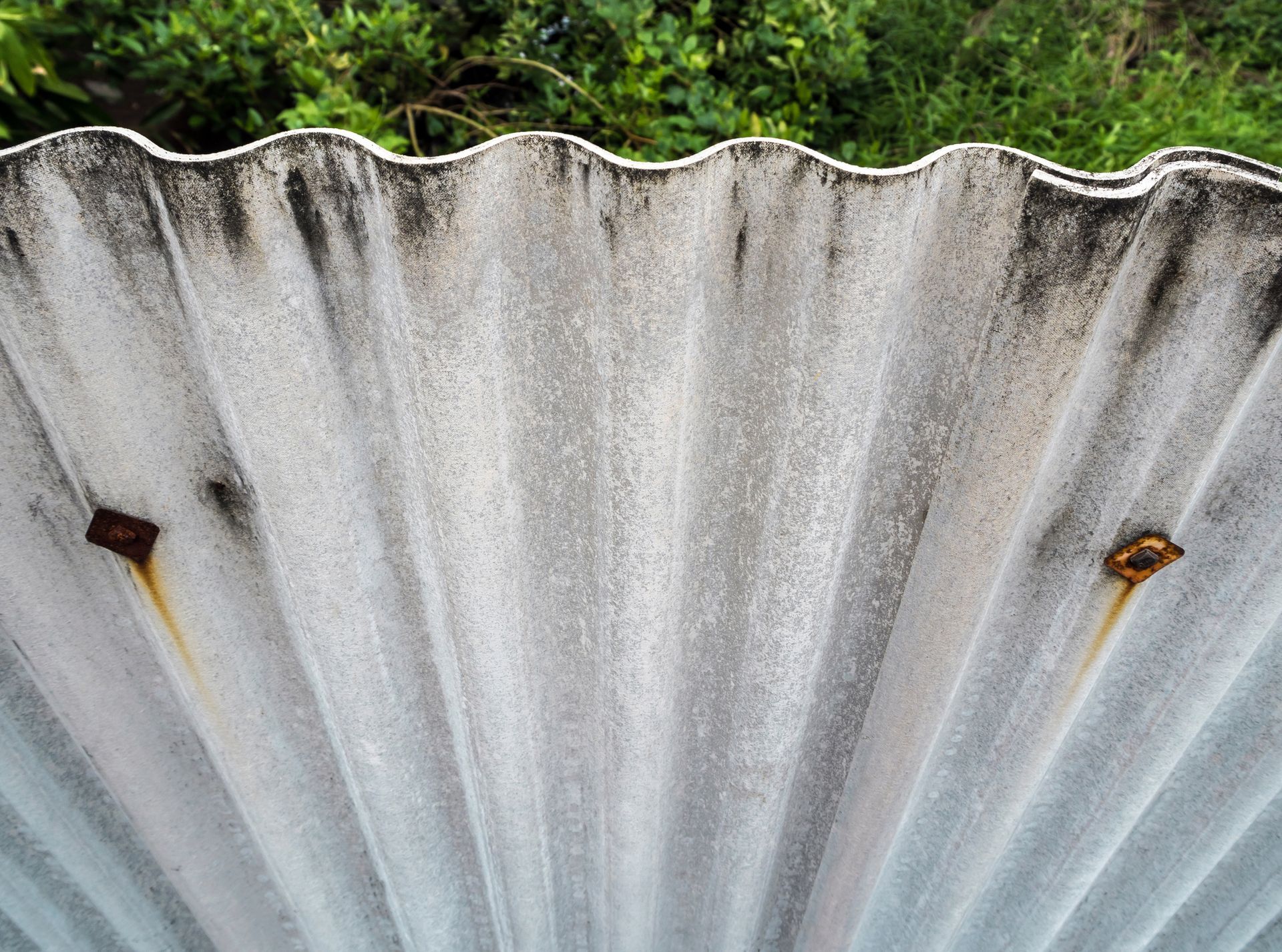 Outdoor fence or wall made by old roof tile. Outdoor fence or wall made by old roof tile.
