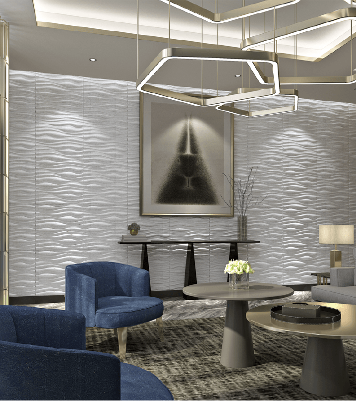 Una sala de estar con sillas azules y una mesa.