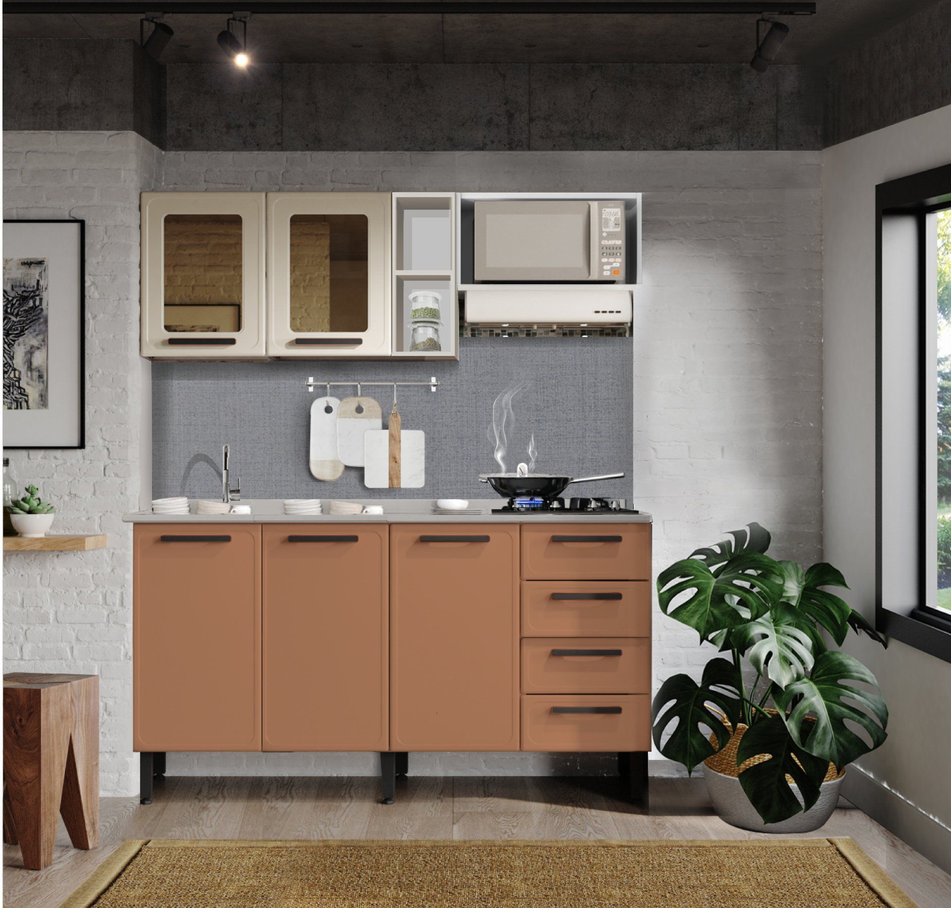 Una cocina con gabinetes naranjas y un microondas.