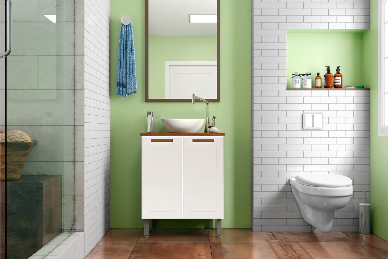 Un baño con lavabo, inodoro, espejo y ducha.