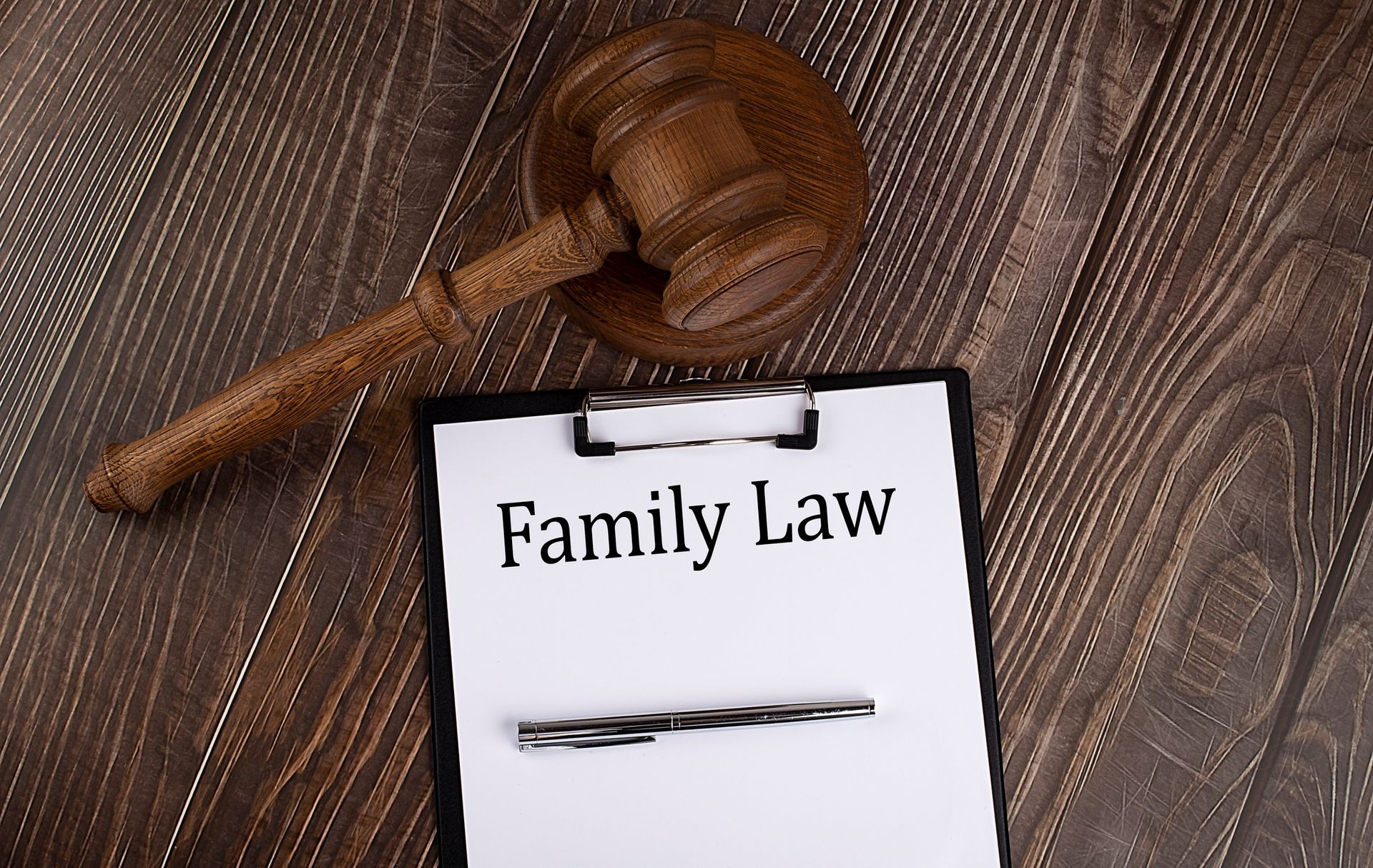 FAMILY LAW text on paper with gavel on the wooden background | Pazner Law Firm | Birmingham, MI FAMILY LAW text on paper with gavel on the wooden background | Pazner Law Firm | Birmingham, MI