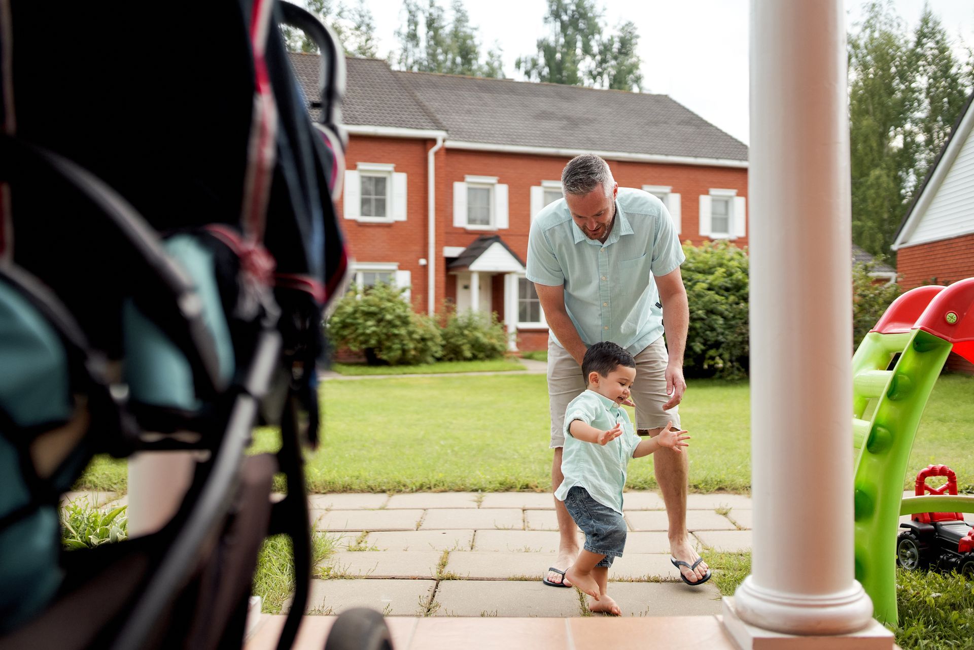 Picture of a father and son playing. Picture of a father and son playing.