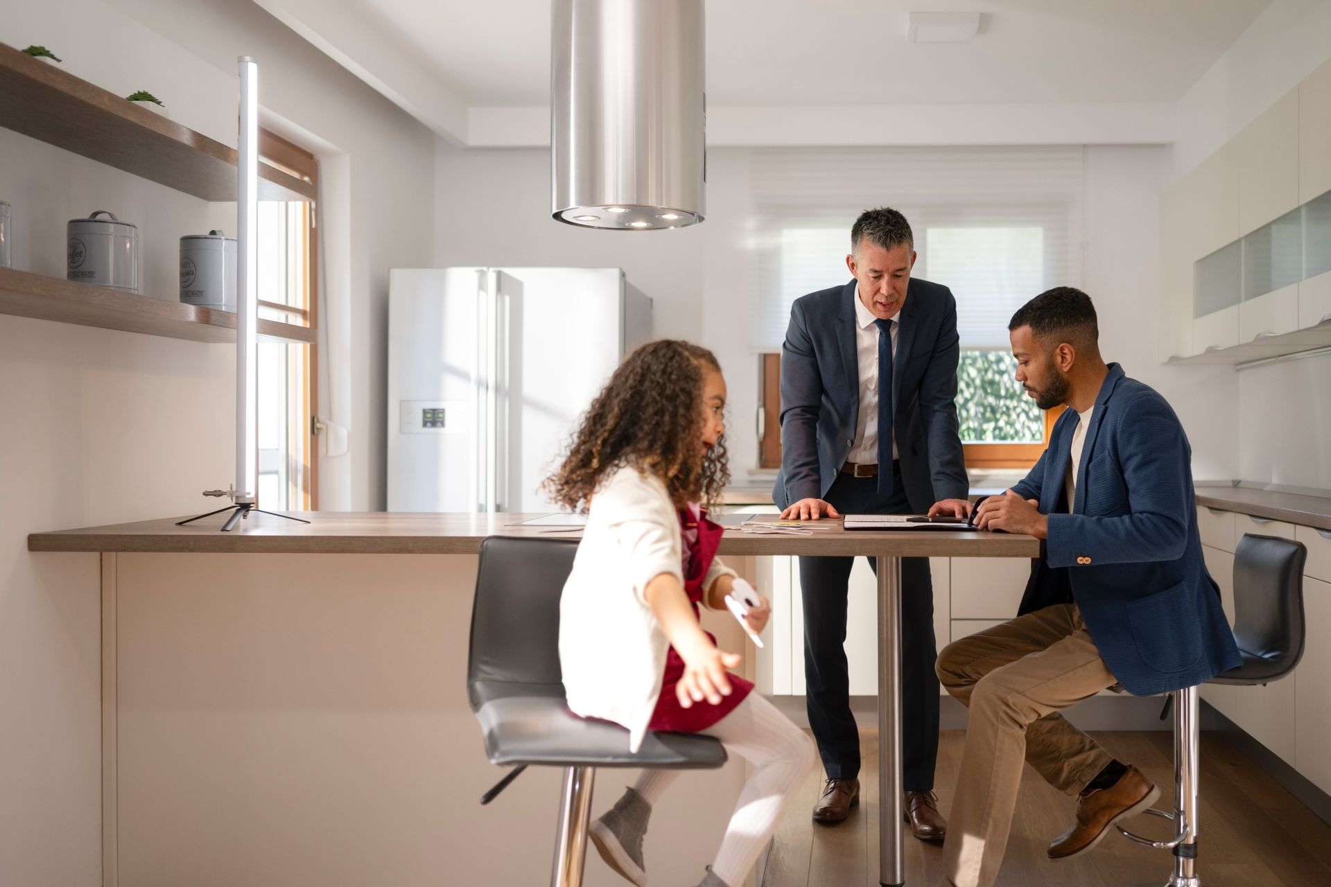 A father with his daughter receiving legal guidance from a divorce lawyer. A father with his daughter receiving legal guidance from a divorce lawyer.