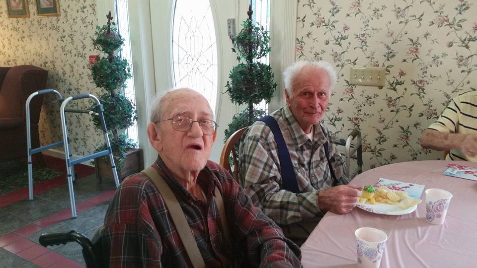 old men having breakfast at the nursing center