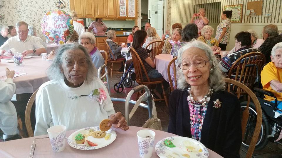 group of smiling women at Waynesboro Manor assisted living center