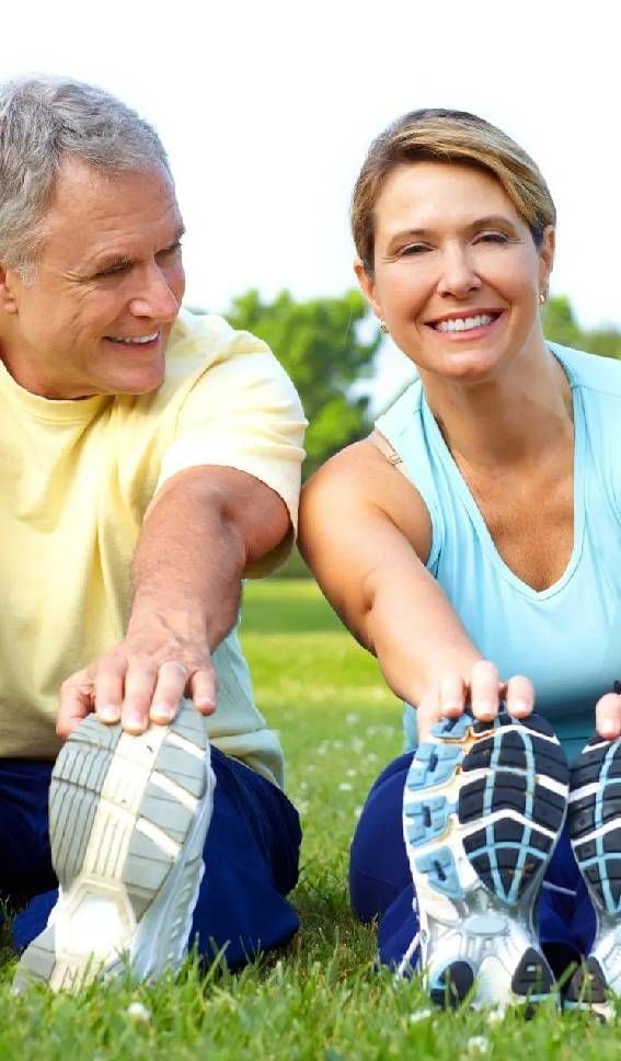 Elderly Seniors Couple Working Out in Park