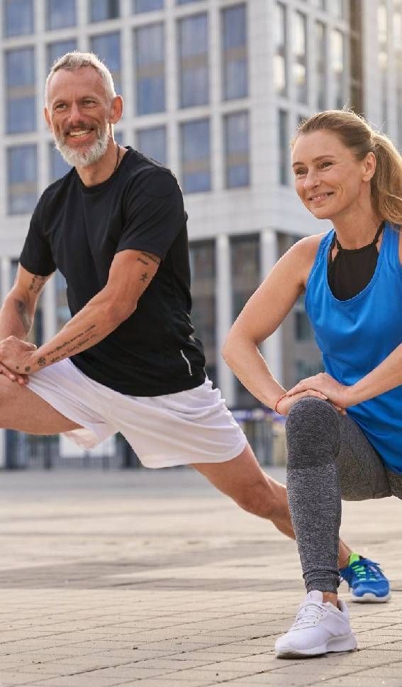 Middle Aged Couple Man and Woman Warming Up