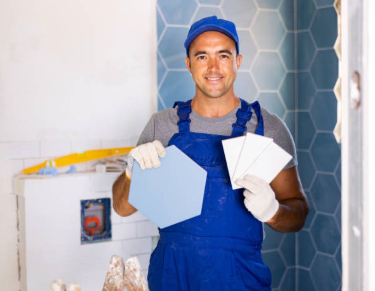 Expert Swansea tiler smiling while working on a project.