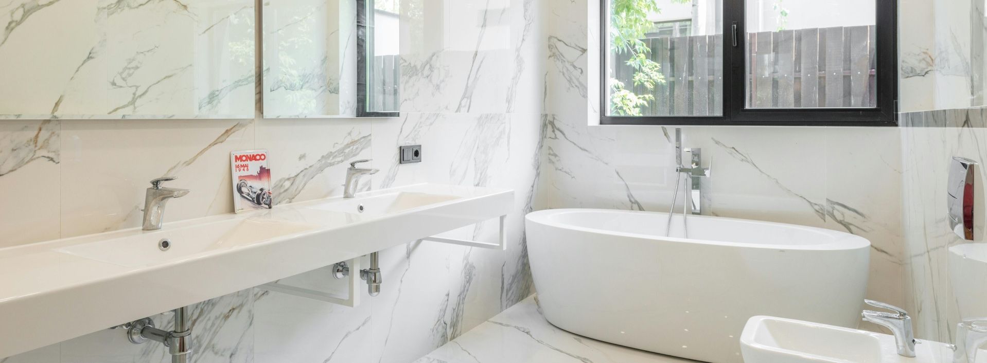 Luxurious marble bathroom with expert tile work in Swansea.