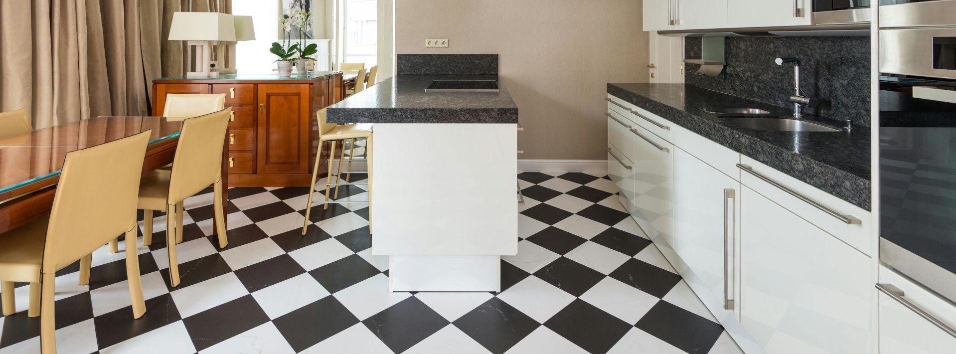 Neatly tiled kitchen floor in a Swansea home.