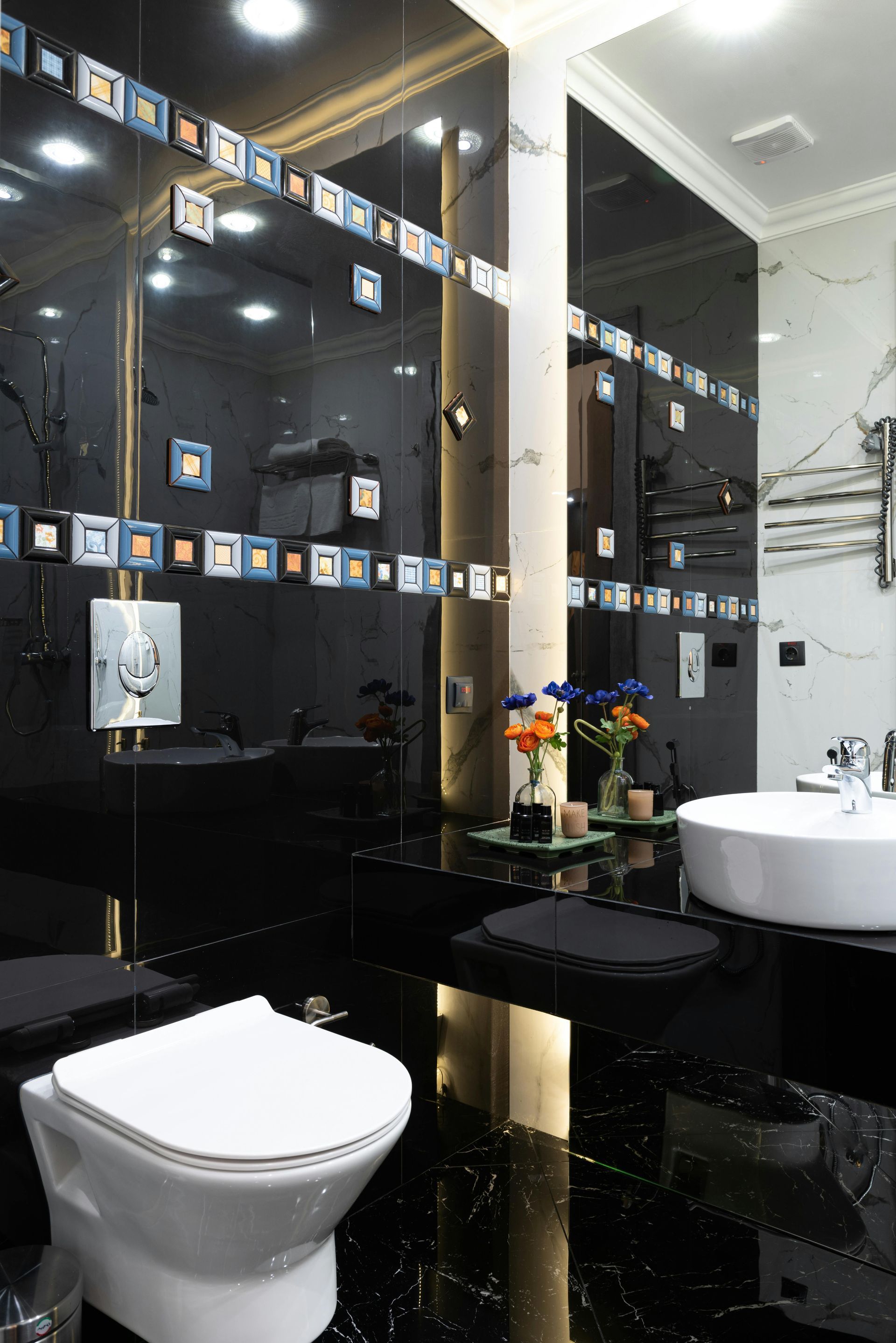 New modern bathroom in dark black by Daffodil tiling in Swansea