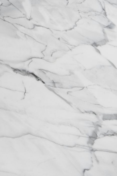 A close up of a white marble texture.