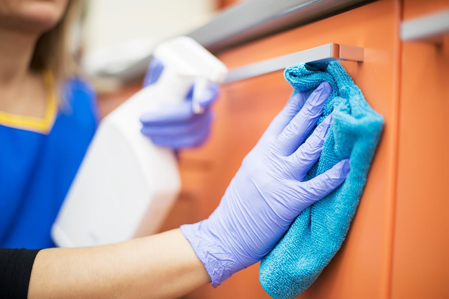 Commercial Cleaning Atlanta — Wiping Cabinet Door in Atlanta, GA