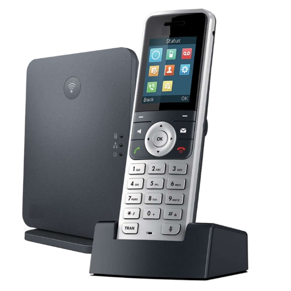 Een draadloze DECT-telefoon staat op een oplaadstation naast het basisstation.