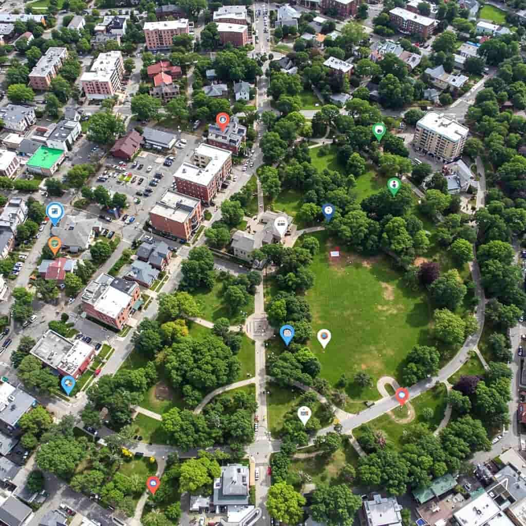 birdeye panoramic view of an urban park with hotspots denoting local businesses