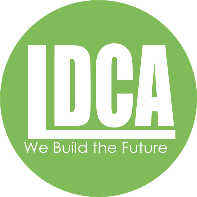 A white logo on a green circle reads "LDCA" with the slogan "We Build the Future" underneath.