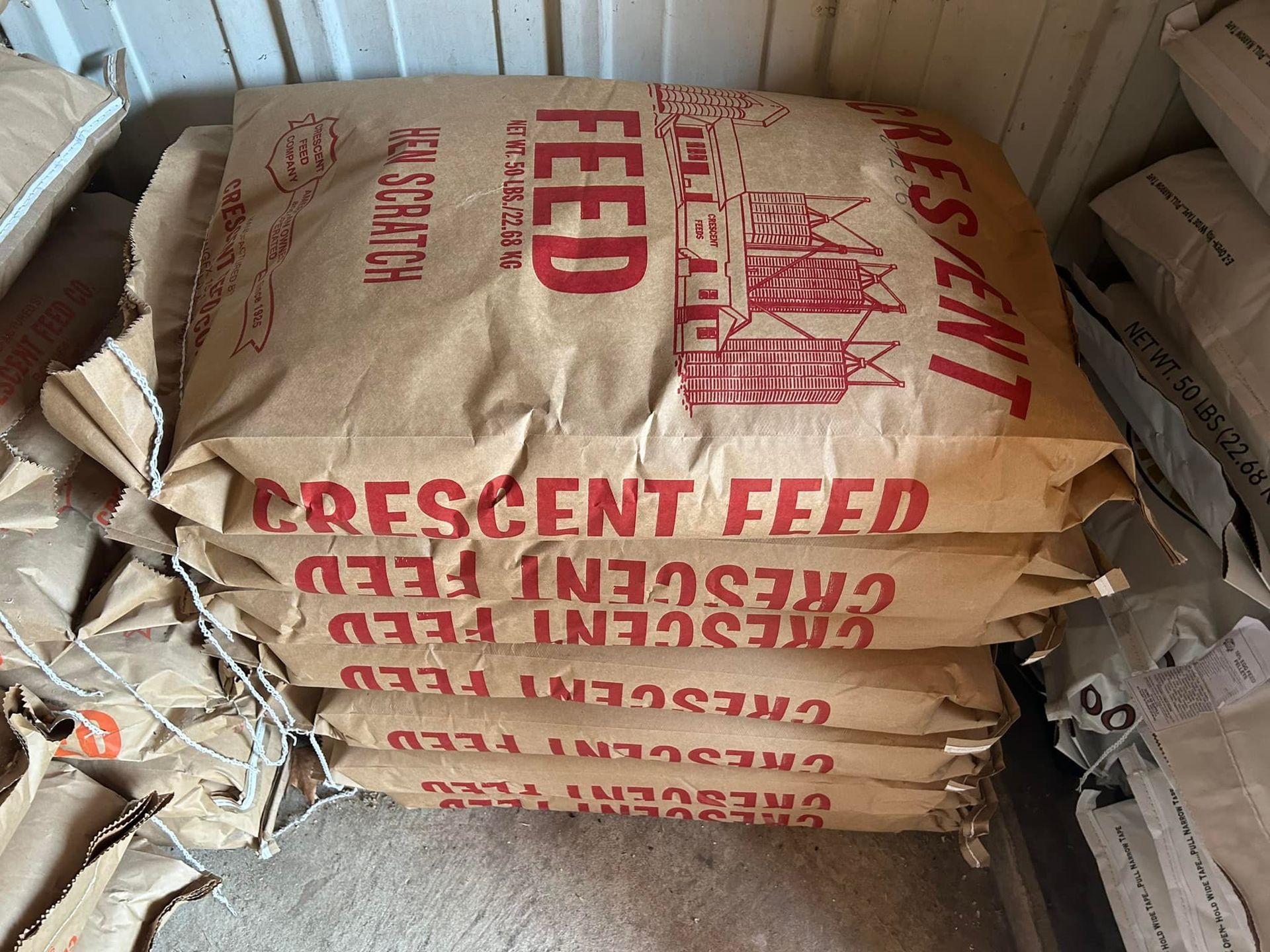 Stack of brown paper bags labeled