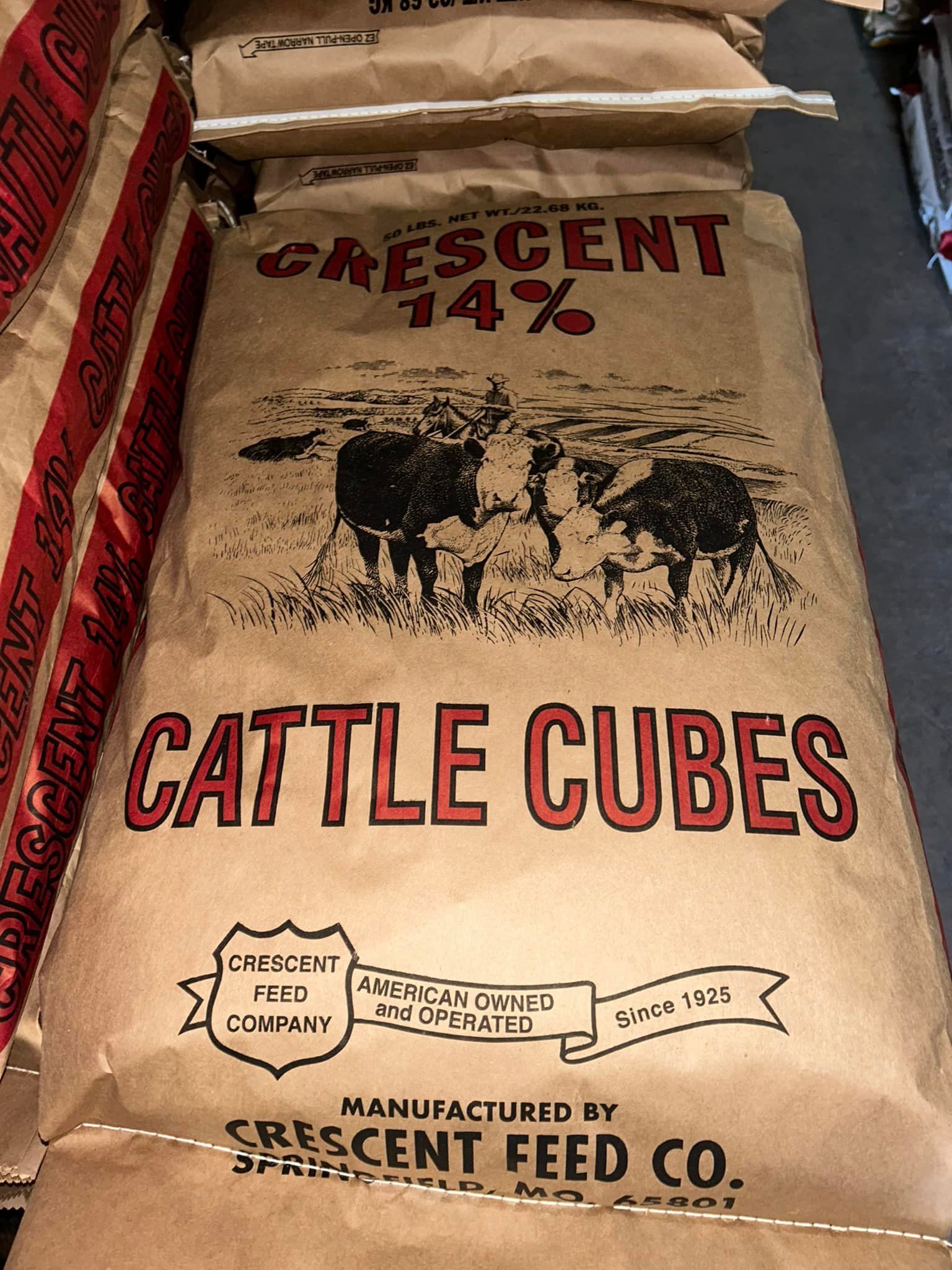 Bag of Crescent 14% Cattle Cubes. Brown paper with cattle graphic, red text.