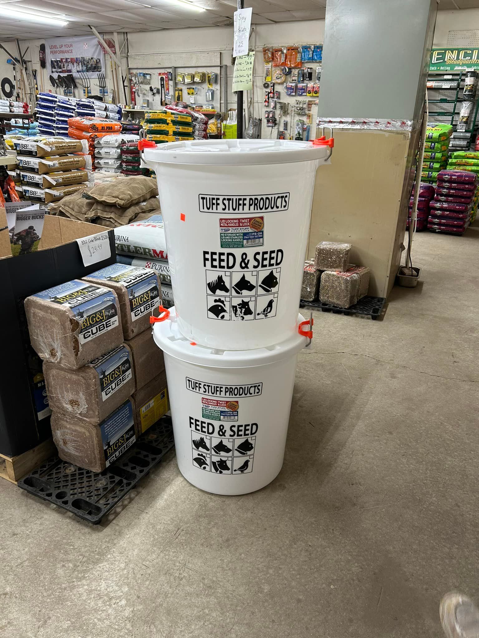 Two white buckets stacked, labeled 