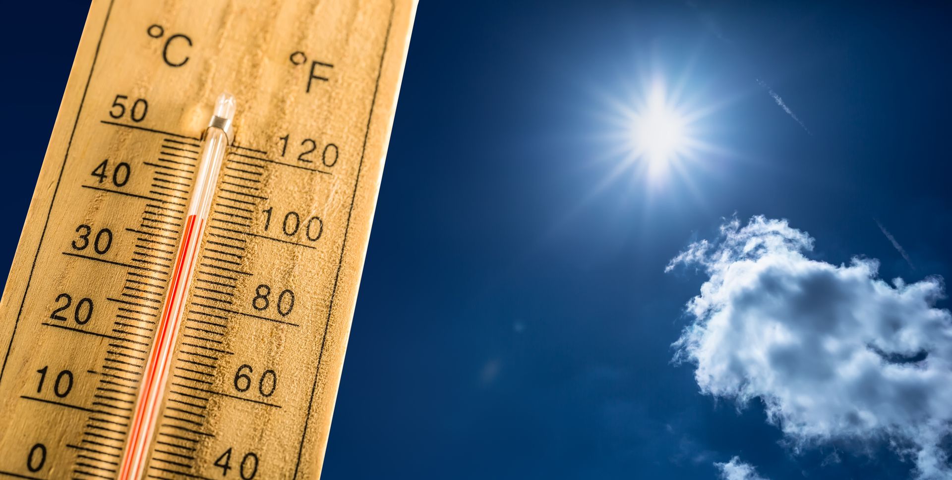 Hot summer day and a hundred fahrenheit on a thermometer — Brian's Hvac & Mechanical