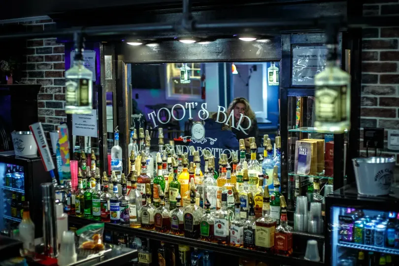 Toot's Bar exterior at dusk