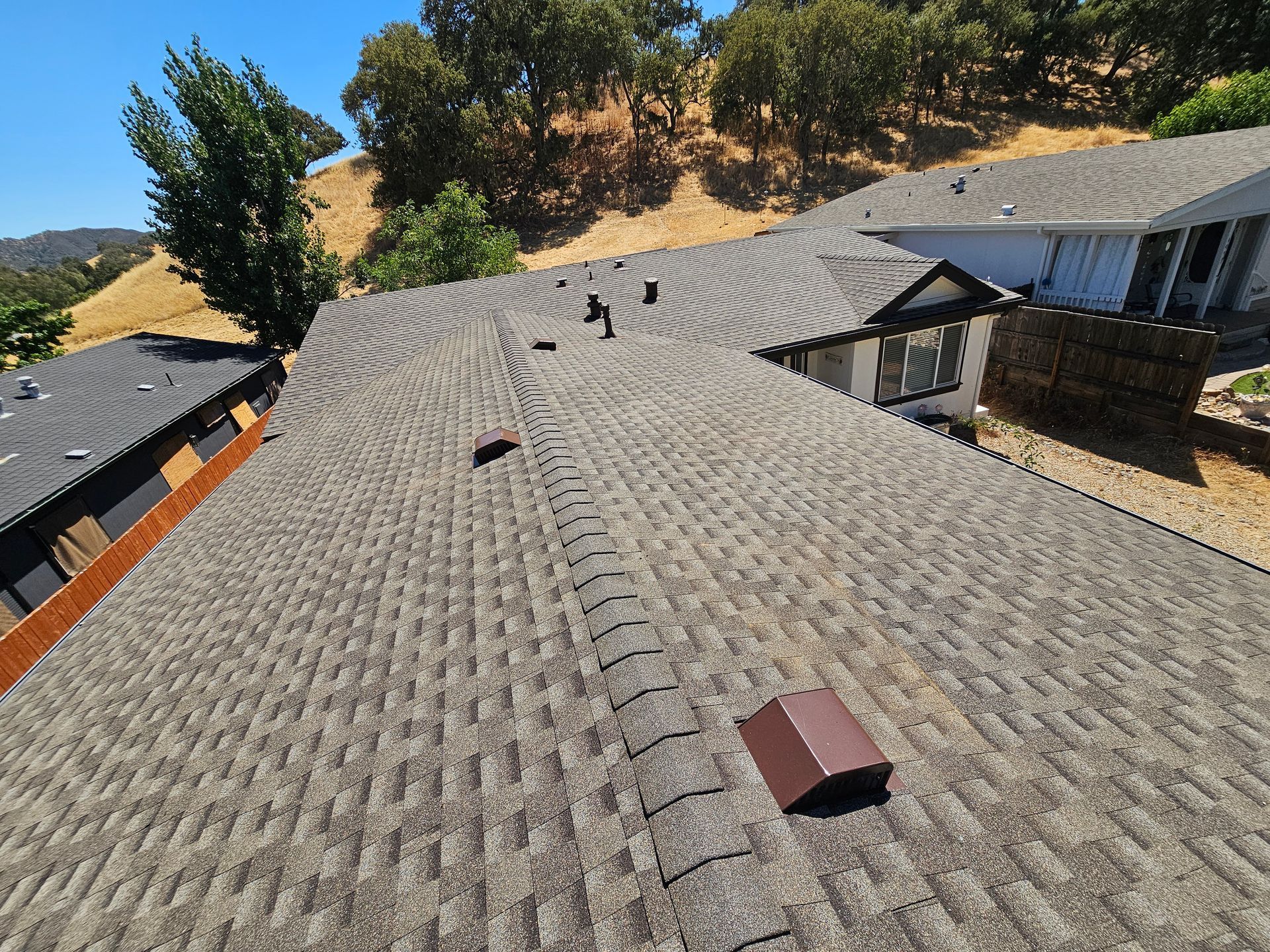 A close up of a roof with shingles on it.