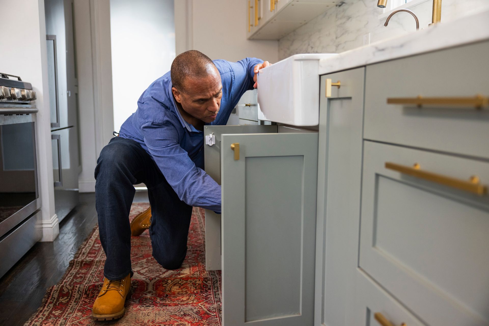 New homeowner examining the residential plumbing components in the house.