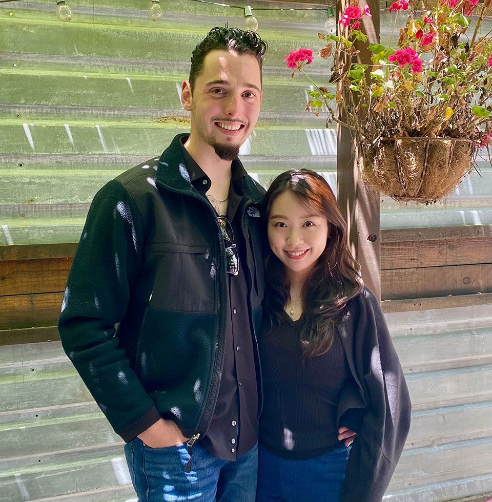 Couple holding one another, image