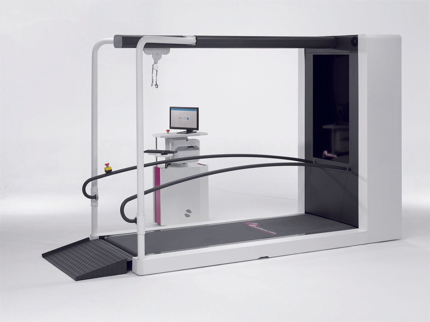 A treadmill with a computer on top of it