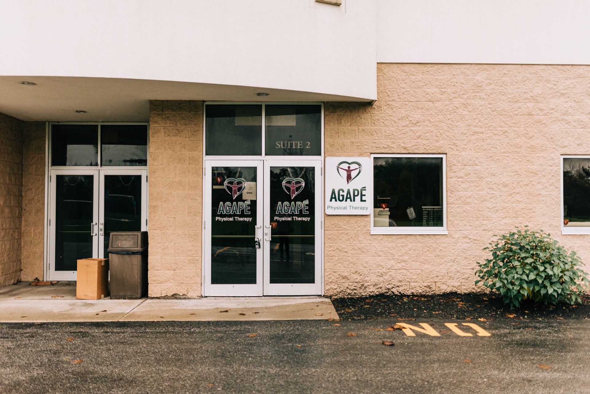 A building with a sign that says agape on it