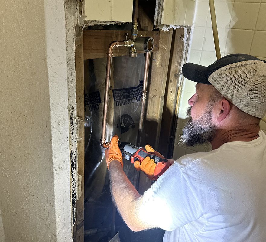 Man Working On Heater