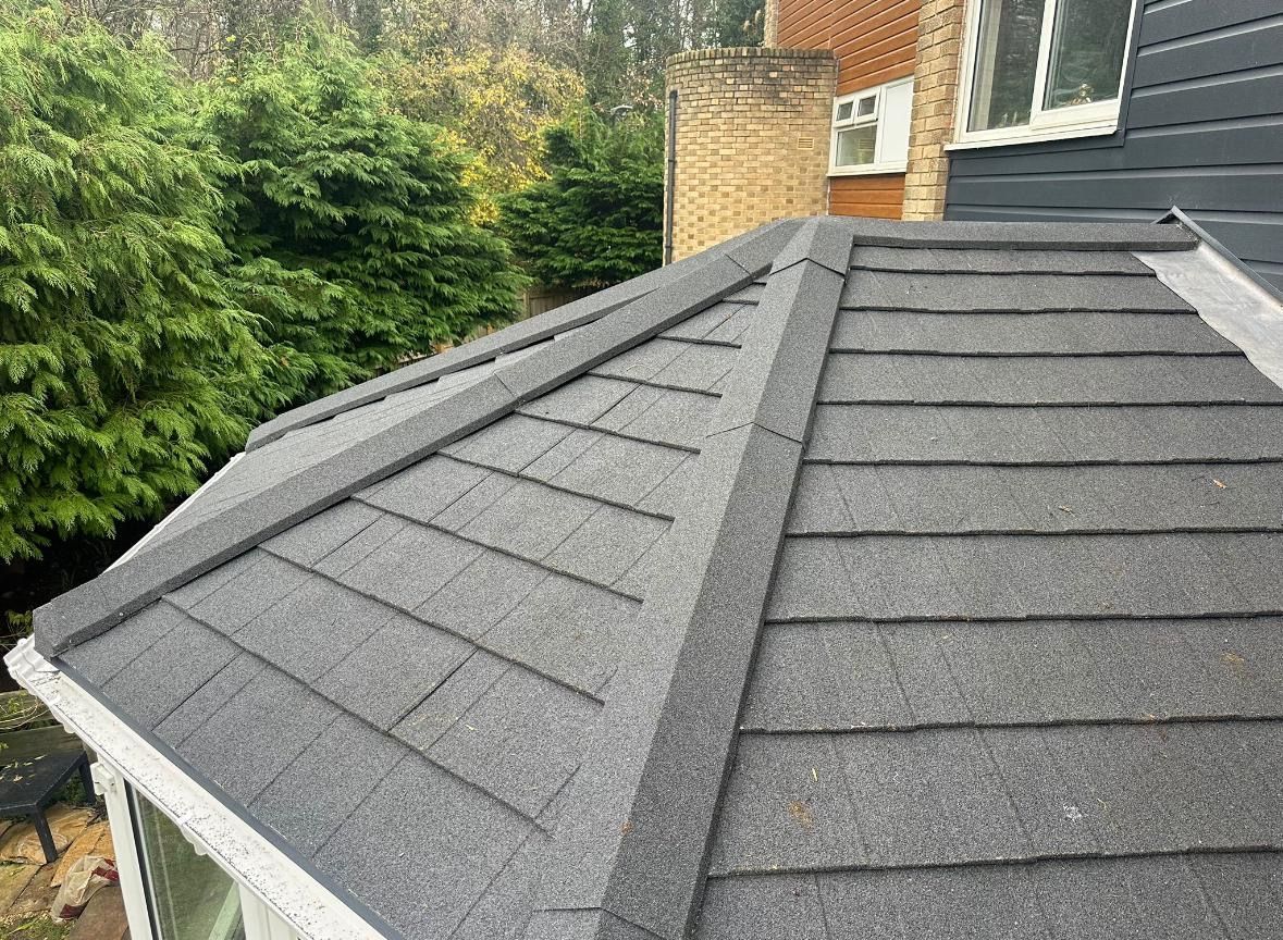 Freshly installed dark tiles on a conservatory in Washington