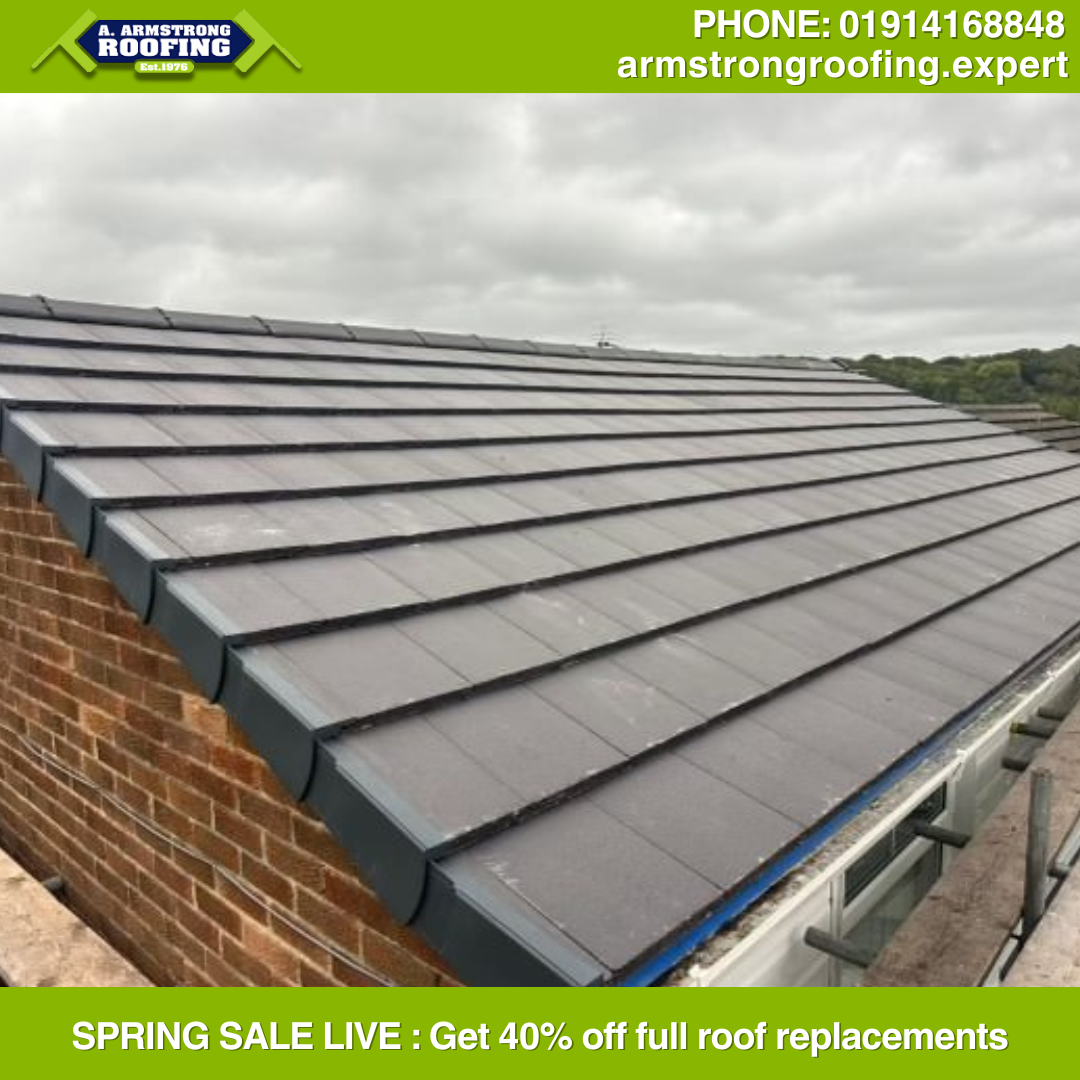Finished pitched roof with ridge tiles, highlighting neat installation and weatherproofing details in Durham.