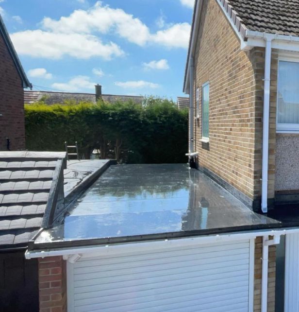 Freshly installed EPDM rubber garage roof 