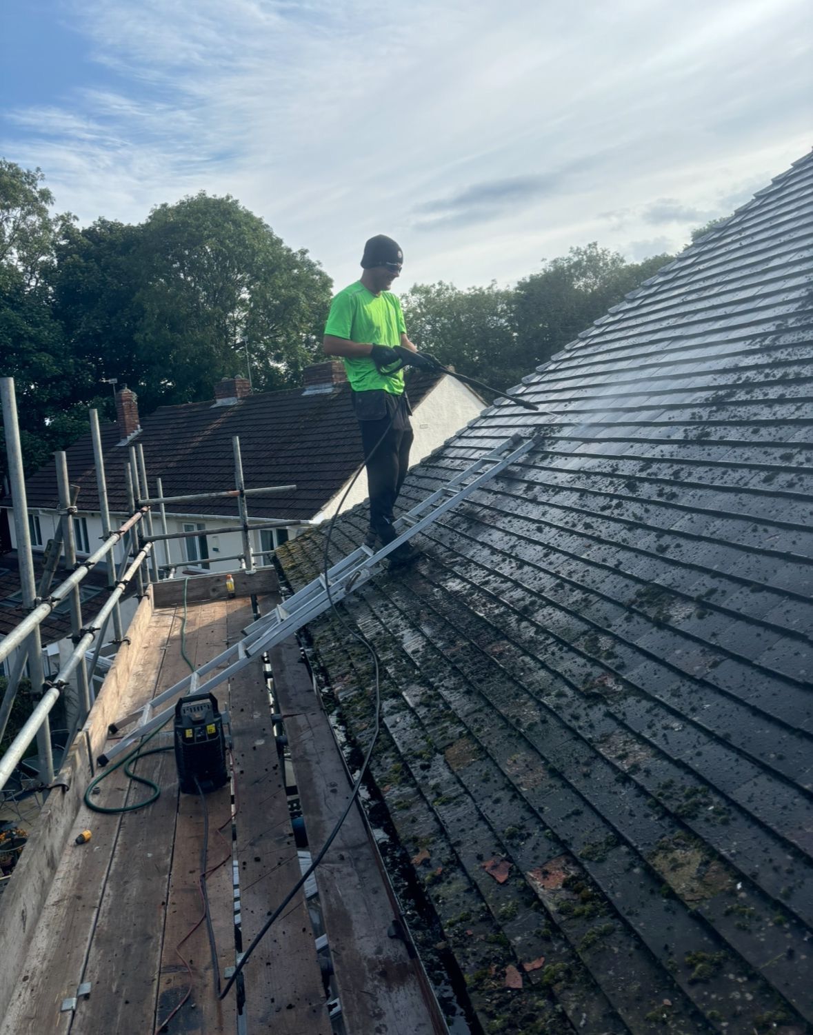 A. Armstrong Roofing cleaning a roof in Boldon