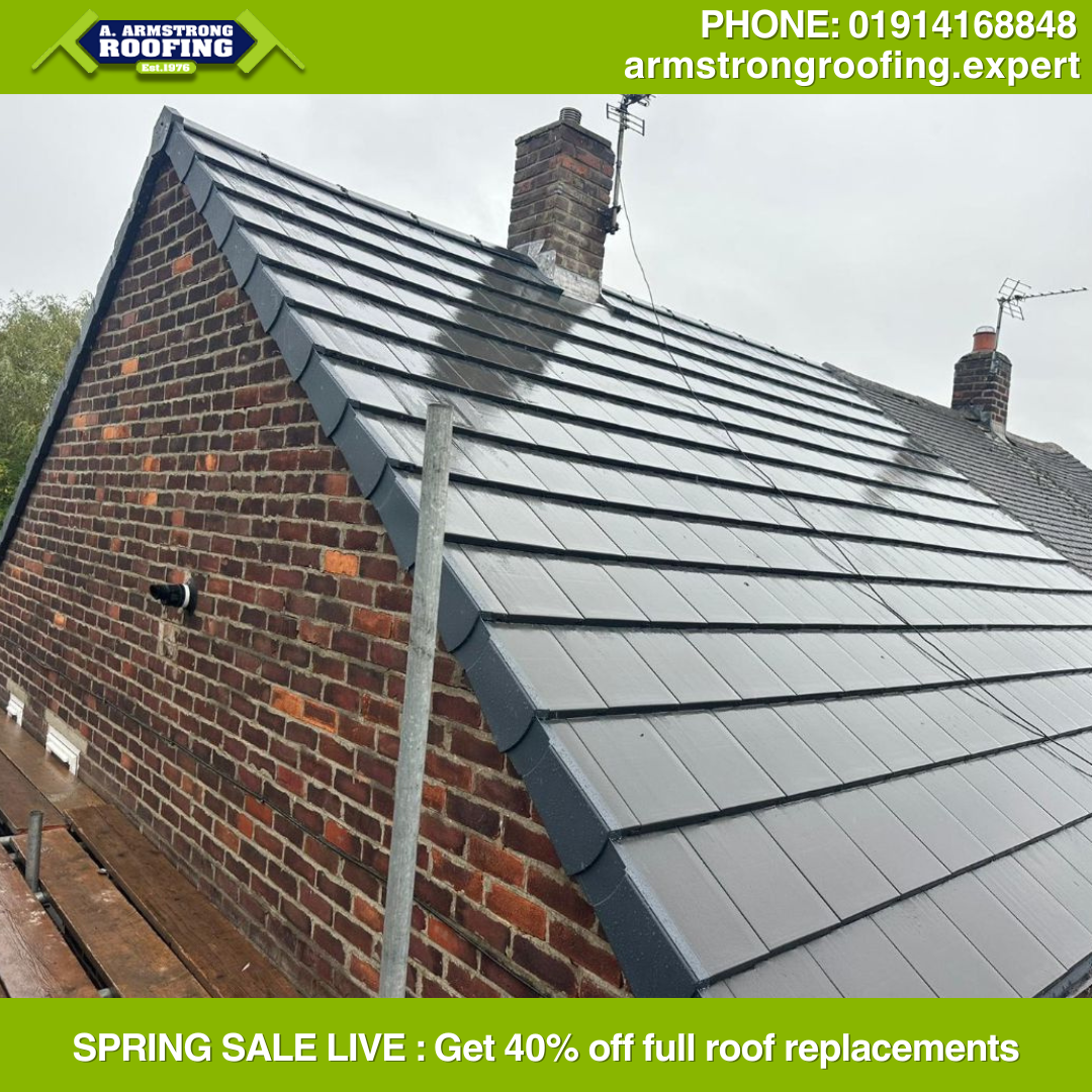 Side-angle view highlighting precise installation of new roofing tiles, chimney flashing, and ridge detail by Armstrong Roofing, providing enhanced weather protection.
