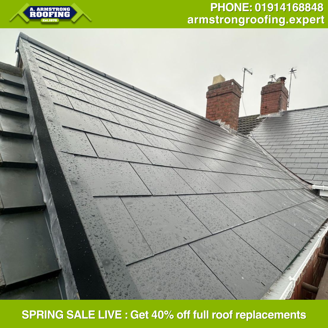 Close-up angled shot of a freshly tiled slate roof, highlighting meticulous craftsmanship, uniform tile alignment, and robust ridge detailing by Armstrong Roofing.