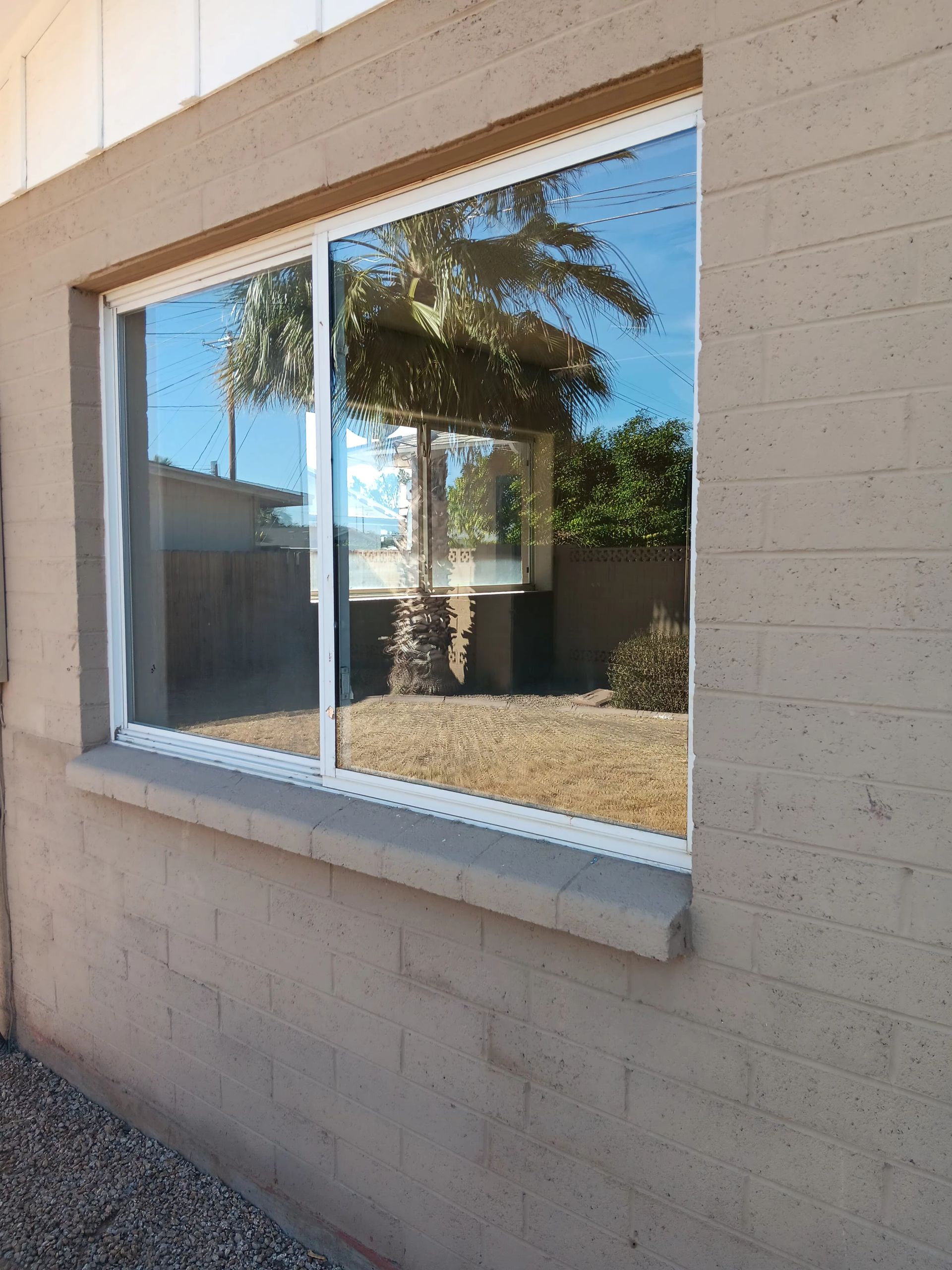two male industrial builders workers window