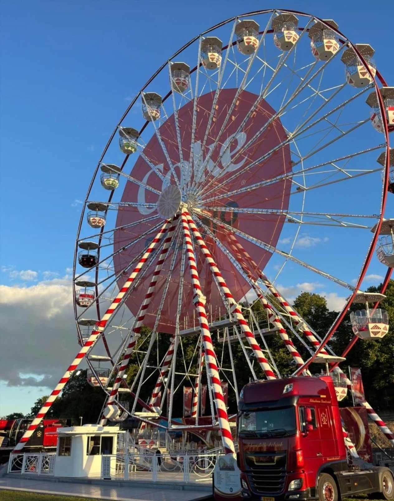 A ferris wheel with the word coke on it