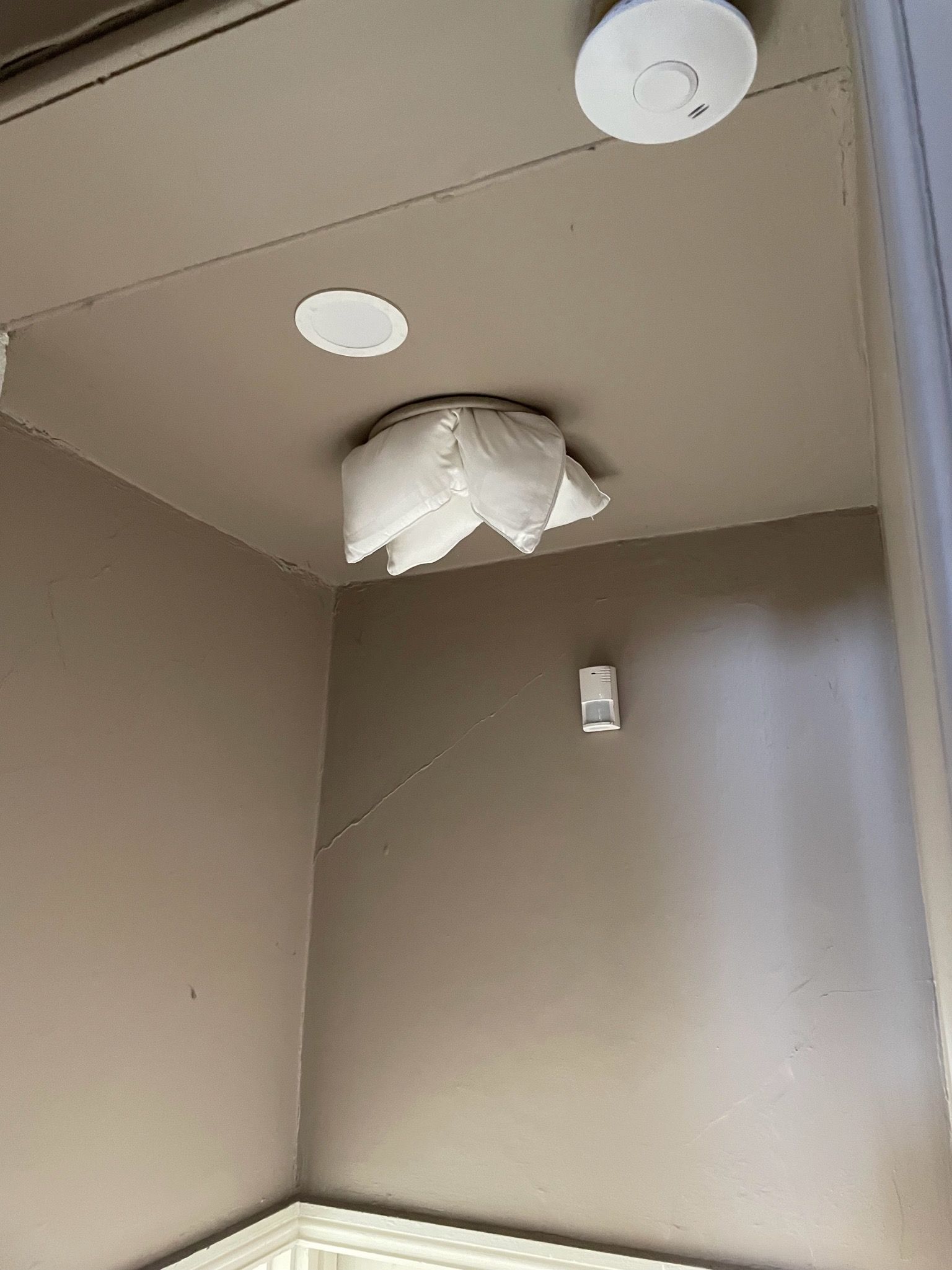 Disused flue plugged with pillows