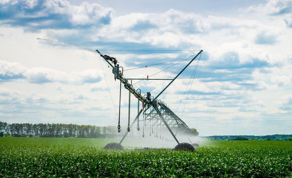 An Irrigation Pivot Watering A Field — Gloucester Rural Supplies in Gloucester, NSW