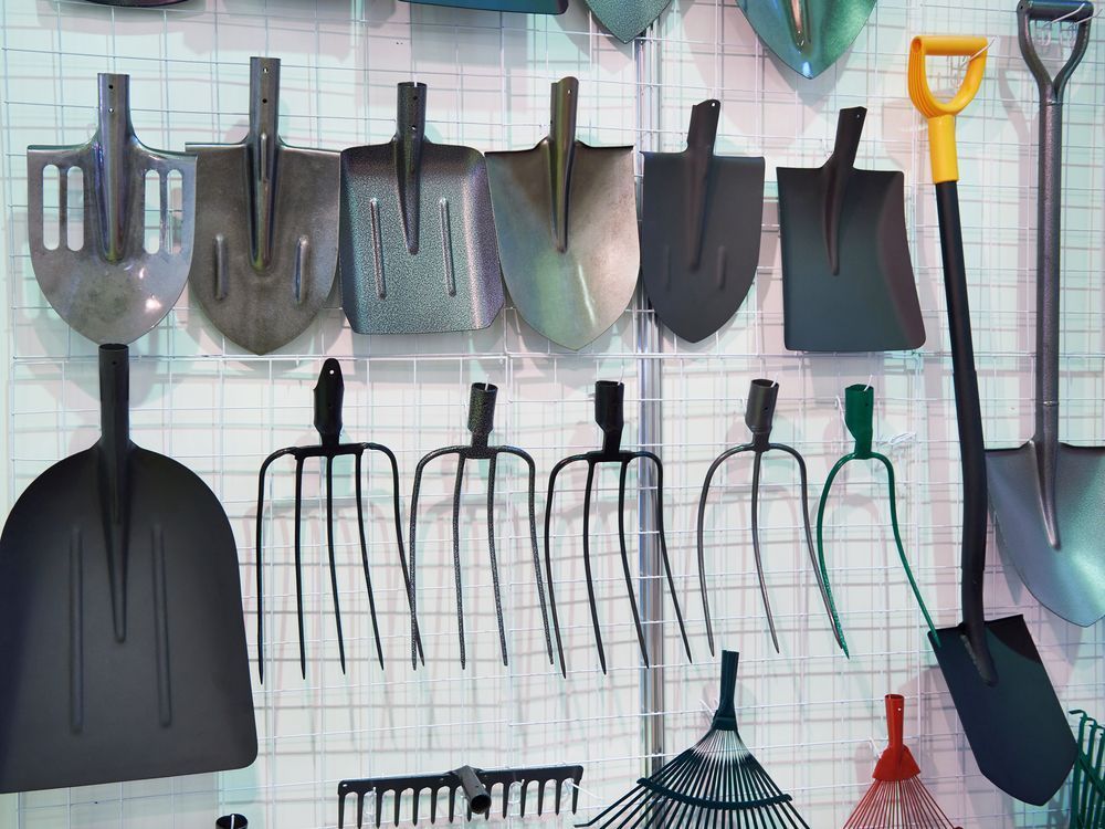 Shovels And Forks In The Hardware Store — Gloucester Rural Supplies in Stroud, NSW