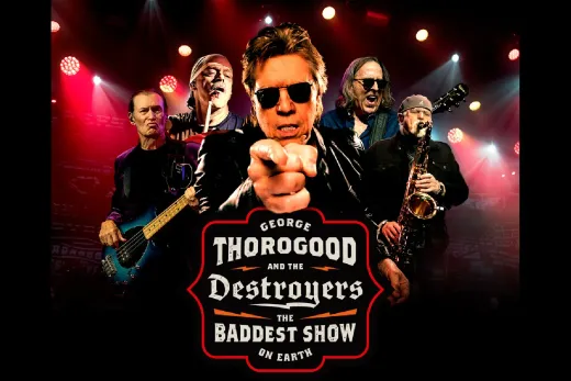 George Thorogood and the Destroyers concert poster with a frontman pointing at the viewer under red stage lights