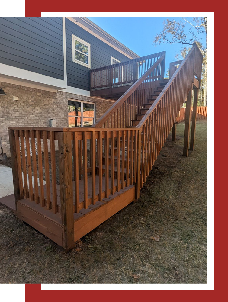A wooden fence with a sign that says premium fence company
