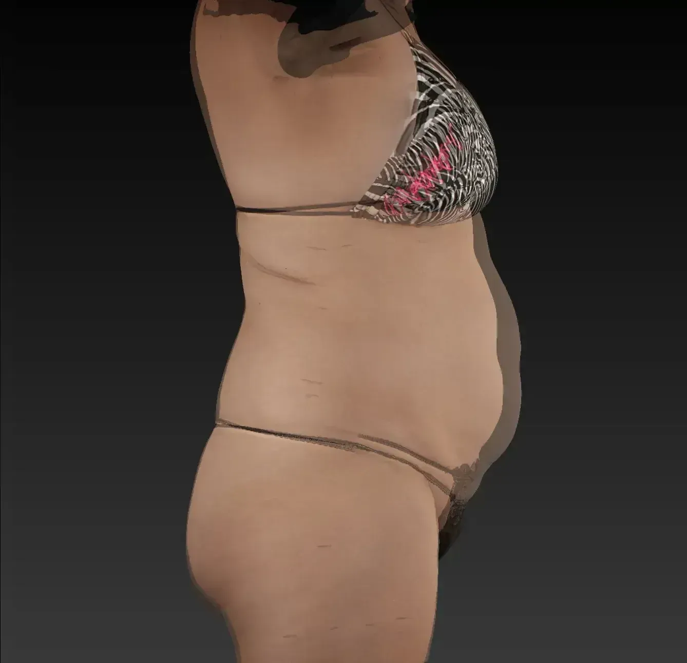 Woman in bikini, side view, showing torso and abdomen. Black bikini top with pink and white pattern.