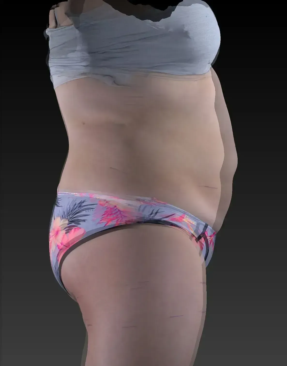 Side view of torso wearing gray top and floral print underwear.