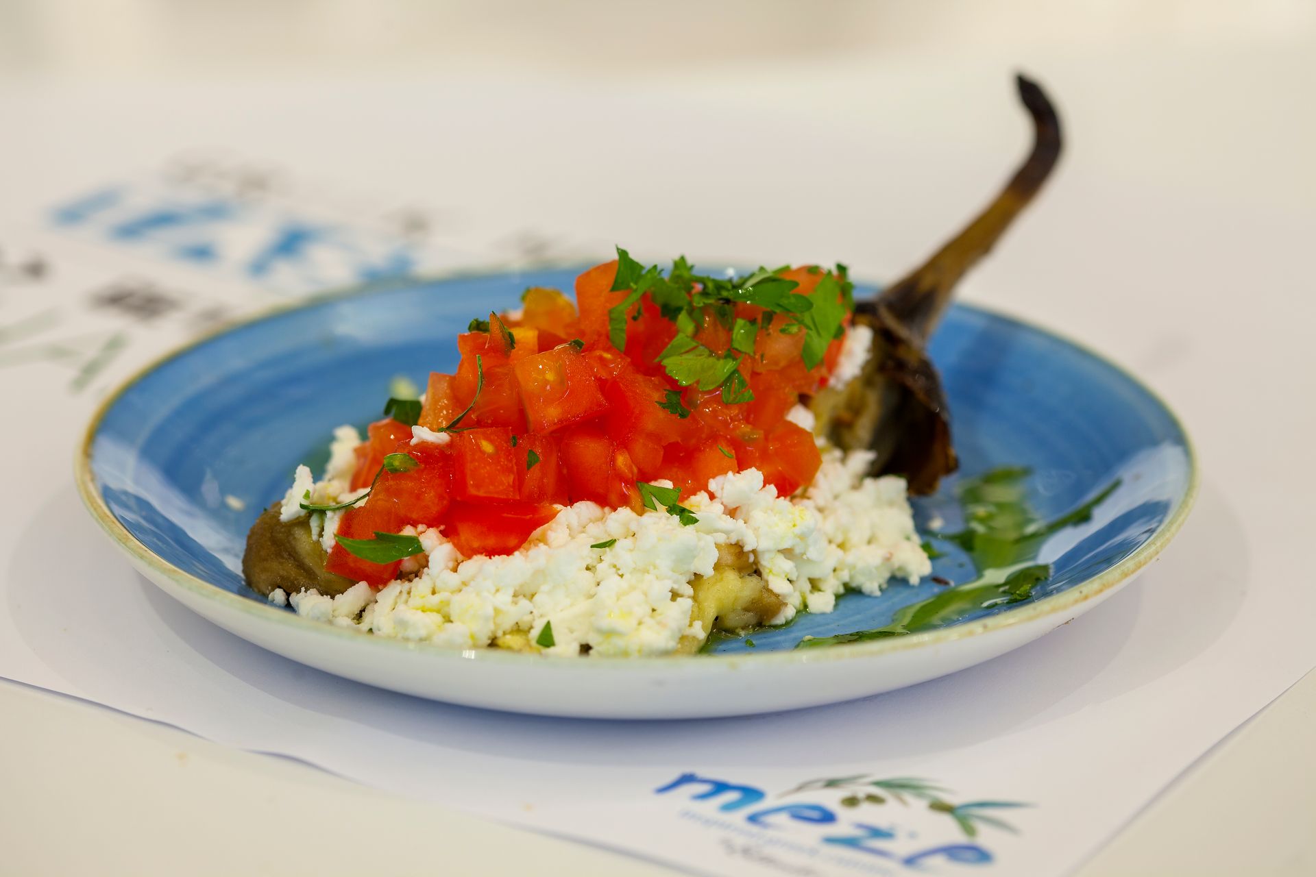 Stuffed eggplant with tomatoes, feta, and herbs at King Jason Protaras.