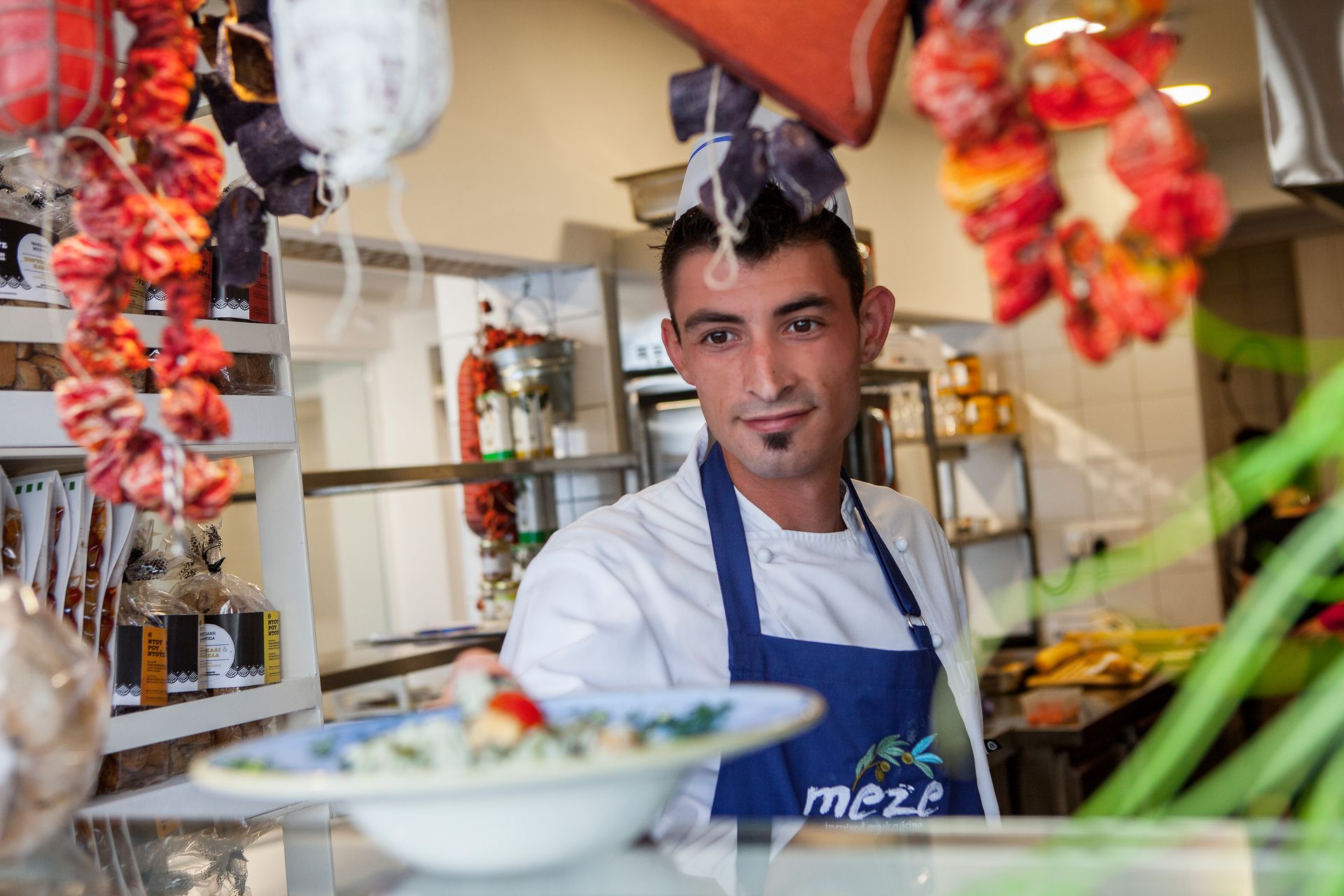 Chef serving at King Jason Protaras.