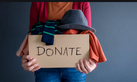 Woman Holding Donation Box | Albany, NY | Hope House Inc
