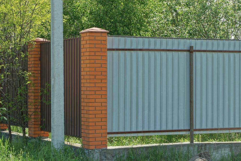 Brick Pillar Fence With Corrugated Metal Panels